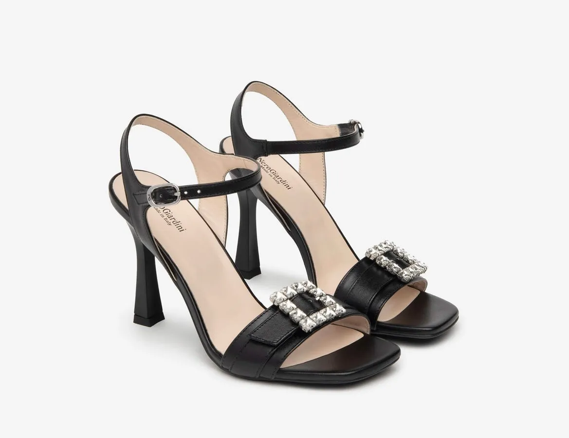 Nerogiardini black leather sandals with diamond detail buckle