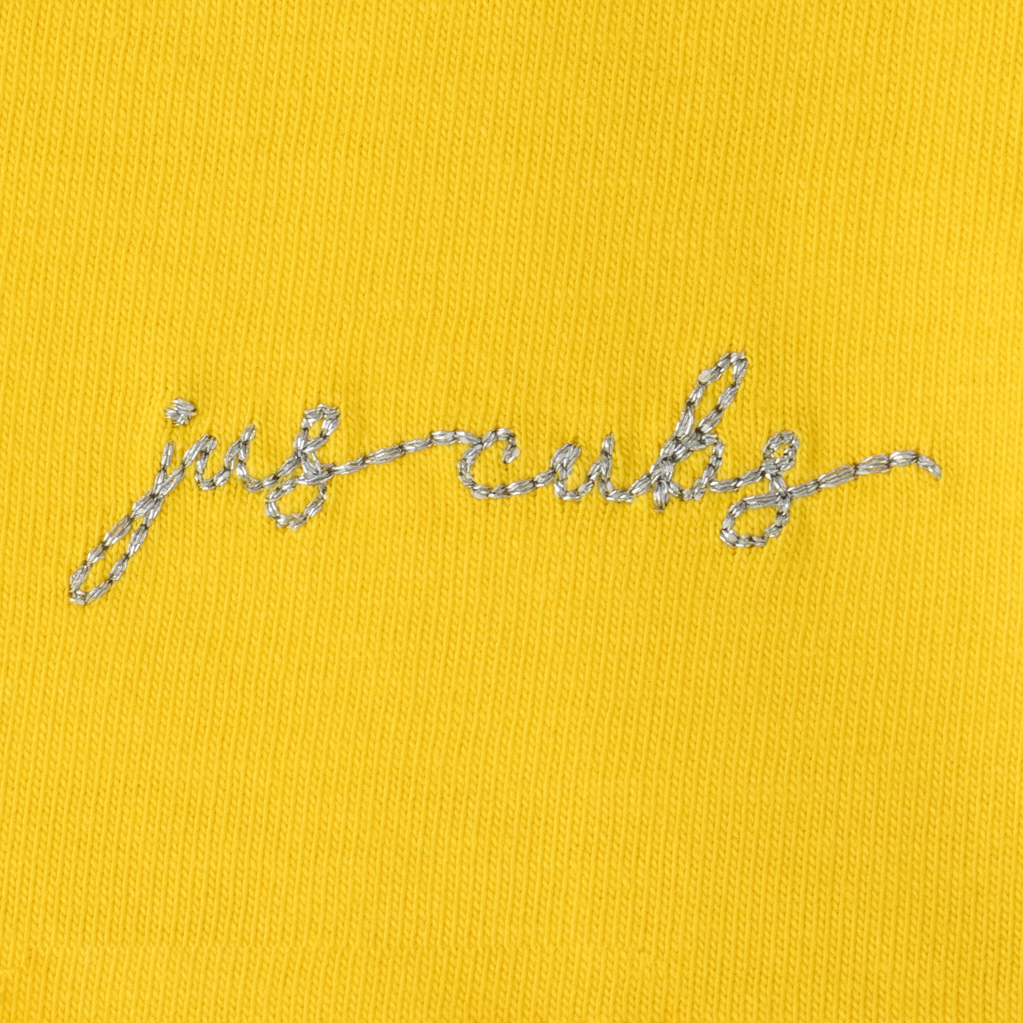 "Girls' Yellow Solid Polo T-Shirt with Ruffled Button Placket , White Collar & Embroidered Logo"